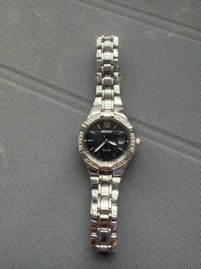 Seiko Solar Silver Watch with Black Dial and Crystal Accents